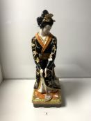 A LARGE CERAMIC 20TH CENTURY FIGURE OF A GEISHA - MADE IN ITALY, 70CMS