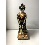 A LARGE CERAMIC 20TH CENTURY FIGURE OF A GEISHA - MADE IN ITALY, 70CMS