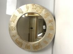 A MODERN CIRCULAR WALL MIRROR WITH OLD ENGLISH GOLD WORDS ON THE FRAME, "BEAUTY FIND THYSELF IN LOVE