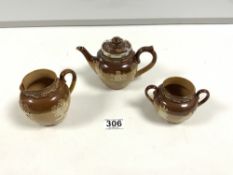 A SMALL DOULTON LAMBETH THREE PIECE HARVEST WARE TEA SET, TEAPOT HAVING A HALLMARKED SILVER COLLAR