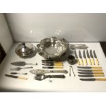 A SILVER-PLATED SWING HANDLE CAKE DISH, PLATED MUFFIN DISH, FISH SERVERS, AND CUTLERY