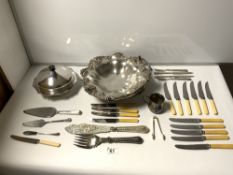 A SILVER-PLATED SWING HANDLE CAKE DISH, PLATED MUFFIN DISH, FISH SERVERS, AND CUTLERY