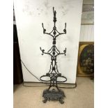 A SMALL ORNATE CAST IRON COAT/STICK STAND WITH DRIP TRAY, 156CMS