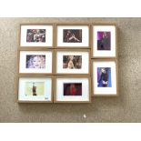 A SET OF EIGHT KYLIE MINOGUE PHOTOGRAPHS - FRAMED TWO BEARING AUTOGRAPHS