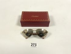 A PAIR OF SUNGLASSES IN BOX - MARKED CARTIER ON GLASSES AND BOX