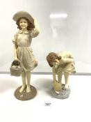 TWO PLASTER FIGURES OF YOUNG GIRLS AT THE SEASIDE COLLECTING SHELLS AND PLAYING WITH A BOAT, 45CMS