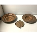 TWO ART NOUVEAU COPPER WALL PLAQUES, 34CMS AND 19CMS AND A MIDDLE EASTERN COPPER ENGRAVED BOWL,