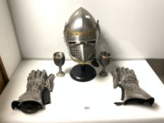 A REPLICA MEDIEVAL KNIGHTS HELMET AND ARMOUR, GLOVES, AND TWO GOBLETS