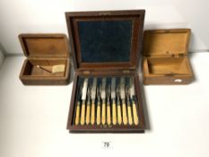 A SET OF IVORY HANDLE CUTLERY IN A MAHOGANY BOX AND TWO CARVED BOXES