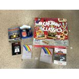 A COMMODORE AMIGA 500 GAMES CONSOLE AND GAMES AND ACCESSORIES