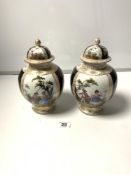 A PAIR OF DRESDEN PORCELAIN LIDDED VASES WITH PAINTED PANELS OF FIGURES AND FLORAL SPRAYS - AUGUSTUS