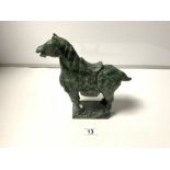 A GREEN SOAPSTONE CARVING OF A HORSE (SOME CHIPS)