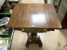 A WILLIAM IV FLAME MAHOGANY DROP LEAF SIDE TABLE ON OCTAGONAL COLUMN SUPPORT AND BUN FEET