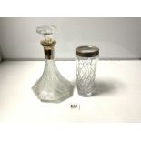 A ROYAL DOULTON CUT GLASS VASE, 21.5CMS, AND AN OCTAGONAL MOULDED GLASS DECANTER, 30CMS