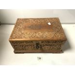 AN EARLY 20TH CENTURY HEAVILY CARVED EASTERN JEWEL BOX WITH TWO SECTIONS TO INTERIOR, 38 X 26 X