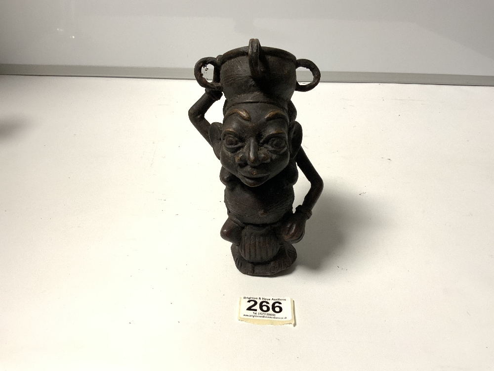 AFRICAN METAL STATUE TRIBAL ART OF A FIGURE CARRYING VESSELS, 19CMS