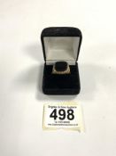 A GENTS HALLMARKED 9CT GOLD 375 SIGNET RING, SET WITH A BLACK ONYX, 7.65 GRAMS