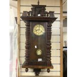 19TH CENTURY WALNUT CASED VIENNA WALL CLOCK WITH WHITE ENAMEL DIAL FLANKED BY TURNED COLUMNS, 98CMS