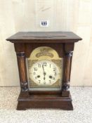 A LATE VICTORIAN OAK MANTLE CLOCK WITH BRASS SILVERED DIAL (SOME EVIDENCE OF WORM) NOT LIVE!