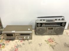 A TECHNICS M8 (RS-M8) STEREO CASSETTE DECK AND A SANYO (M9940K) PORTABLE RADIO CASSETTE PLAYER