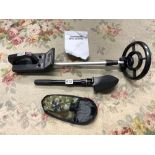 A BRAND NEW METAL DETECTOR MD - 3008 AND A FOLDING SHOVEL