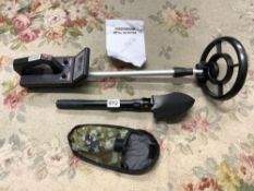 A BRAND NEW METAL DETECTOR MD - 3008 AND A FOLDING SHOVEL
