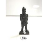 A BRONZE MODEL OF A BRITISH POLICEMAN, 17CMS