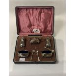 HALLMARKED SILVER SIX PIECE CONDIMENT SET WITH THREE MATCHING SPOONS BY ADIE BROTHERS IN ORIGINAL