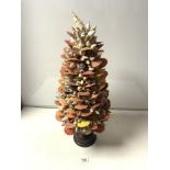 A TALL CONICAL SHAPED SHELL DISPLAY ON WOODEN STAND, 72CMS