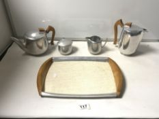 A VINTAGE PICQUOT WARE FOUR-PIECE TEA-SET ON MATCHING TRAY