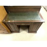 A LATE VICTORIAN MAHOGANY LEATHER TOP ONE PIECE KNEEHOLE DESK WITH ONE DRAWER AND TWO CUPBOARDS, 115