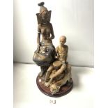 A LARGE LLADRO STONEWARE FIGURE OF TRIBES PEOPLE, WITH A CAT AND A DRUM - SIGNED TO BASE- J RUIZ