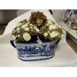 A VICTORIAN STYLE BLUE AND WHITE FOOT BATH WITH DRIED FLOWERS