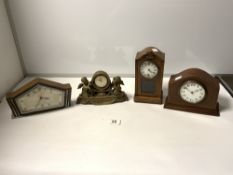 A SMALL ART DECO METAL MOUNTED MANTEL CLOCK, AND THREE OTHER MANTEL CLOCKS