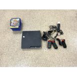 A PS3 CONSOLE AND CONTROLS, WITH A PS2 AND PS4 GAMES - VARIOUS