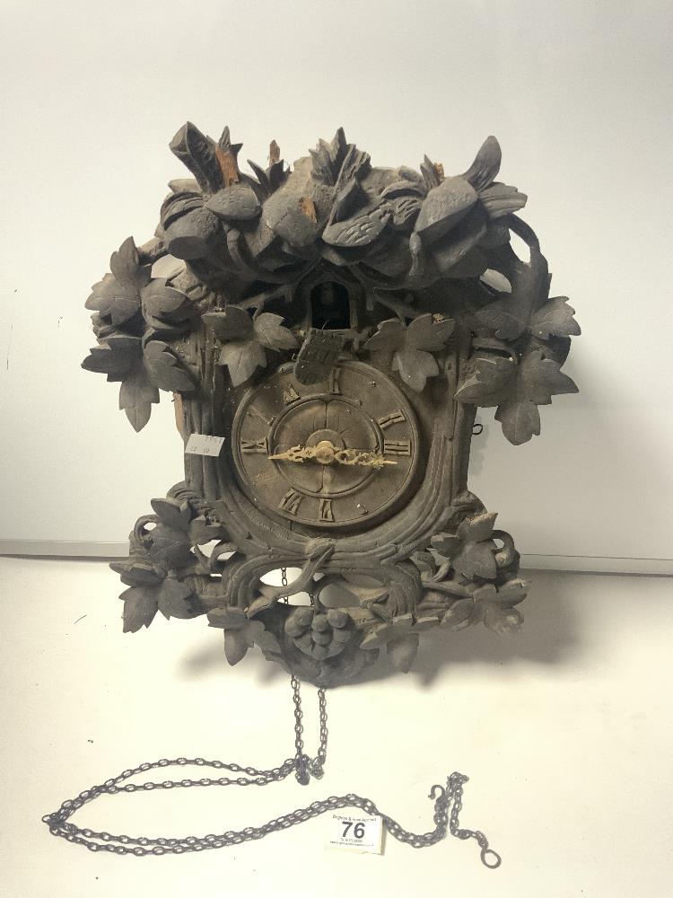 A LATE 19TH CENTURY CARVED SWISS CUCKOO CLOCK, WITH CARVED LEAF DECORATION