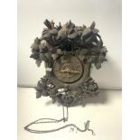 A LATE 19TH CENTURY CARVED SWISS CUCKOO CLOCK, WITH CARVED LEAF DECORATION