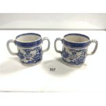 A PAIR OF STAFFORDSHIRE BLUE AND WHITE TWO HANDLED IMPERIAL QUART TANKARDS, 13CMS