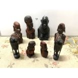 EIGHT AFRICAN CARVED HARDWOOD BUSTS, THE LARGEST 31CMS