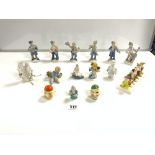 A CERAMIC SNOW WHITE AND THE SEVEN DWARFS TOAST RACK, PORCELAIN BAND, AND OTHER FIGURES