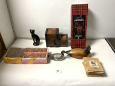 BOX SET JUNIOR PLAYABLE BAGPIPES, A CARVED BOX CIGARETTE DISPENSER, A MODEL OF A CAT ETC