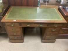 A LATE VICTORIAN RED WALNUT PEDESTAL DESK WITH NINE DRAWERS, 122 X 66CMS