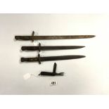 THREE WORLD WAR I BAYONETS AND ARMY KNIFE WITH MILITARY CROWS FOOT AND DATED 1943