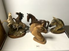 A RESIN HORSE GROUP OF STALLIONS FIGHTING (A/F), 40CMS, A RESIN HORSE BUST, AND A CARVED WOODEN