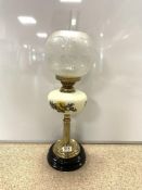 A VICTORIAN BRASS OIL LAMP WITH CORINTHIAN COLUMN SUPPORT WITH OPAQUE RESERVOIR, 64CMS WITH SHADE