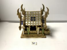 A SMALL ORIENTAL GILT AND MIRRORED TEMPLE