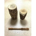 TWO AFRICAN DRUMS, THE LARGEST 40CMS WITH A WOODEN RECORDER BY ADLER