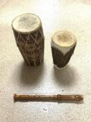 TWO AFRICAN DRUMS, THE LARGEST 40CMS WITH A WOODEN RECORDER BY ADLER