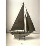 A CUT STEEL MODEL OF A SAILING BOAT ON STAND, 58 X 76CMS