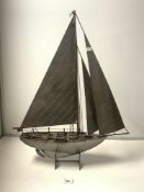 A CUT STEEL MODEL OF A SAILING BOAT ON STAND, 58 X 76CMS